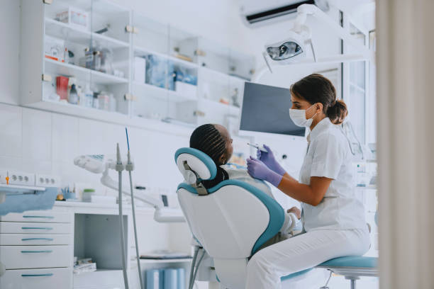 female dentist with patient